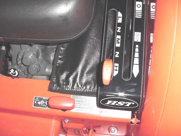 The two fillers are to be velcroed together in the center (mating velcro will be evident on the fillers) and this center seam should be lined up directly below the steering column.
