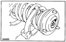 REMOVE SHOCK ABSORBER (a) Remove the bolt and nut and disconnect the shock absorber from the lower suspension arm.