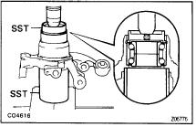 (b) Using SST and hammer, tap in a new oil seal until it is flush with end surface of the carrier.