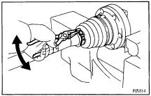 SA48 SUSPENSION AND AXLE REAR DRIVE SHAFT (e) Using a hammer, lightly tap the end of the drive shaft, disengage the axle hub and remove the drive shaft.