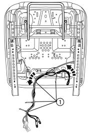 Holding the DVD headrest in one hand insert the two cables into the headrest support holes on the top of the seat (1). (Figure 24.) 2.