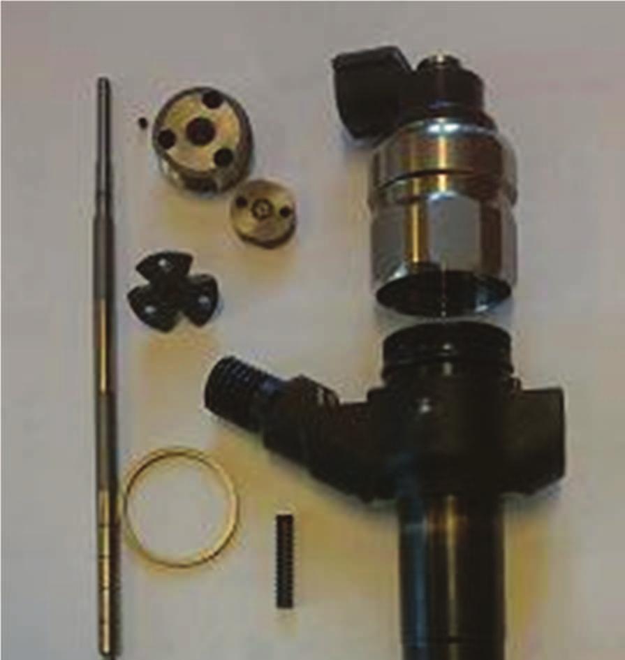 Fig. 7. Electromagnetic Denso fuel injector disassembly on spare parts Figure 8 presents electromagnetic Delphi fuel injector. These injector is very fast because of light valve.