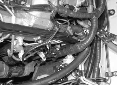 engine outlet to heat exchanger inlet with hose clamping pliers and pull off connection piece on