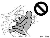 The front passenger sit as far back as possible from the dashboard. All vehicle occupants be properly restrained using the available seat belts.