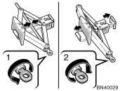 Tool holder 4. Jack 5. Spare tire Turn the jack joint by hand. To remove: Turn the joint in direction 1 until the jack is free.