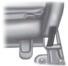 E205052 1. Pull the strap located at the bottom outboard of the seatback to release the seat from the floor, and rotate the seat up toward the front seat. 2.