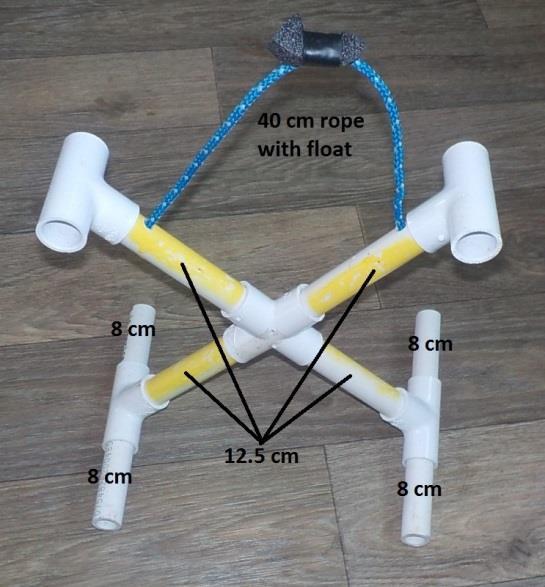 40 cm of rope (colors may vary) is used as a grab point. Drill two holes 0.5 cm below the tees.