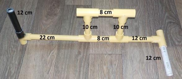 The 12 cm black handle should be parallel (in line with) the central yellow section.