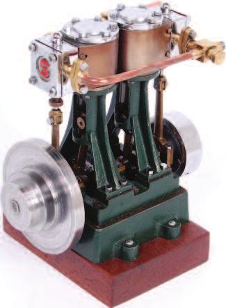side cylinders with end drain cocks, driving steel crankshaft bearing 6 inch heavy cast spoke flywheel and a small 2 3/4 inch flywheel for belt drive at opposing side, slip eccentric valve control,