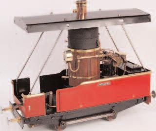 5 inch gauge scratch built De- Winton type 0-4-0 engine with wood clad upright boiler feeding 2 simple expansion cylinders with mechanical