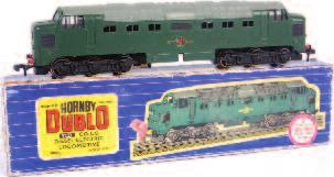 (VG-BG) 140-160 647 A Hornby Dublo EDP12 Duchess of Montrose train set, containing a gloss green loco and tender, 2 stanier red/cream coaches, minor area of corrosion at base of guards door, no