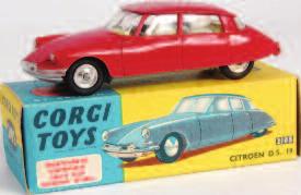(VG,BVG) 40-60 1746 Corgi Toys, 231 Triumph Herald Coupe, gold and white body with red interior, flat spun hubs, in the original blue and yellow all-card box (VG,BG- VG) 50-70 1747 Corgi Toys, 271