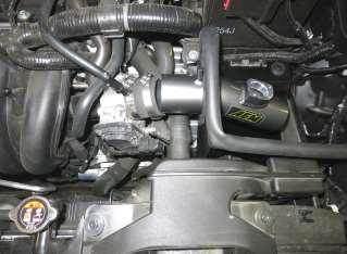 f. Fasten the snorkel to the radiator shroud using the (2) M6 bolts