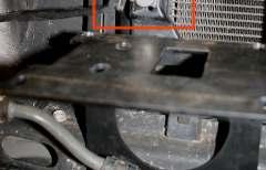 Remove the stock skid plate fastened by 4 bolts (12mm socket) 2 in front and 2 on bottom toward the rear.