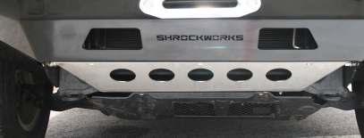 10. Use 3-3/8 x 1 bolts with 2-5/16 washers, a 3/8 lock washer and a 3/8 nut to loosely fasten the wide part of the Shrockworks Skid Plate to the bottom bumper face.