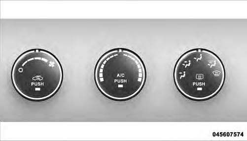 260 UNDERSTANDING YOUR INSTRUMENT PANEL Manual Heating and Air Conditioning The Manual Temperature Controls consist of a series of outer rotary dials and inner push knobs.