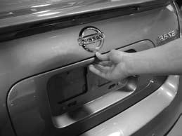 OPENING THE TRUNK To open the trunk release using the request switch, your intelligent key must be with you. Push the request/release switch under the trunk handle.