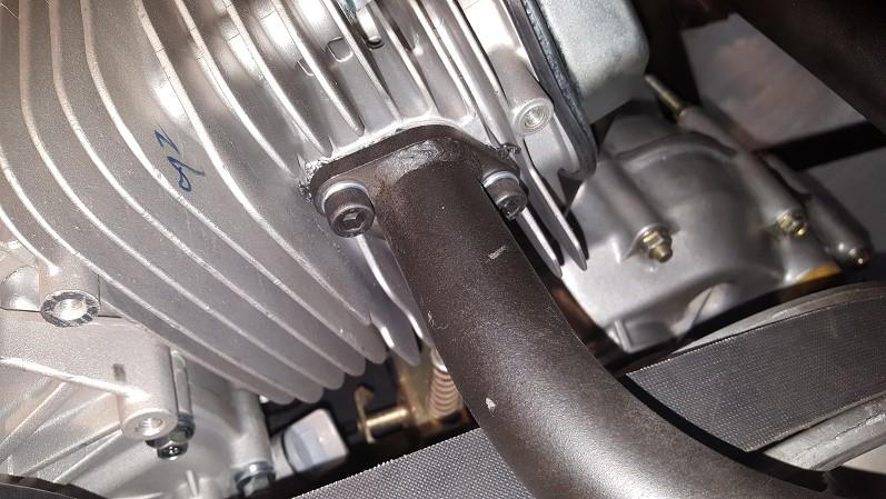20. The provided exhaust is mounted to the engine via (2) Allen head bolts with