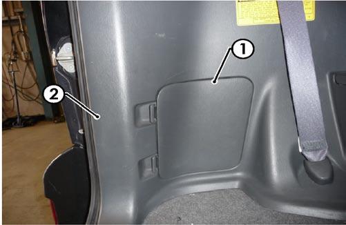 Remove the five fasteners (1) from the rear trim, then remove the rear trim (2). 2.