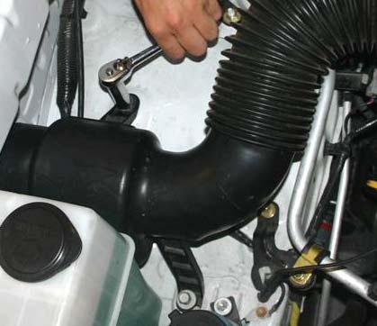 10. Remove intake air tube from inner fender i. Remove two 12mm bolts. (Fig.