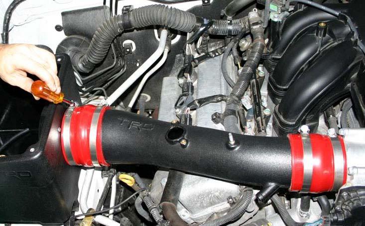 Do not tighten the clamps on the TRD intake tube at this time. (Fig. D15) Tighten both clamps as shown iv.