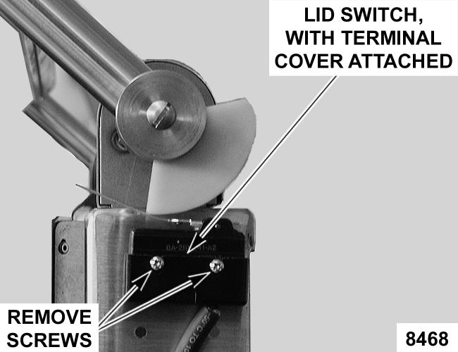 UP LIMIT SWITCH WARNING: DISCONNECT THE ELECTRICAL POWER TO THE MACHINE AND FOLLOW LOCKOUT / TAGOUT PROCEDURES. 1. Remove front panel as outlined under COVERS AND PANELS. 2.