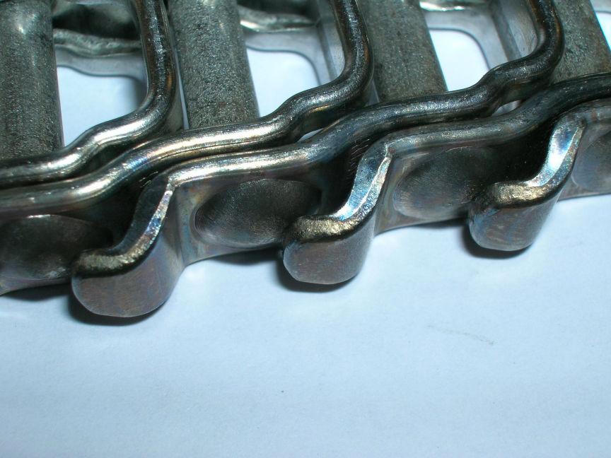 Standard on all tension bearing links. Increases belt life by reducing belt elongation. BELT SPECIFICATIONS Wear per Pitch (in) 0.