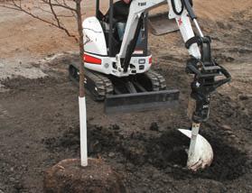 ) The grapple operates with wrist-like fl exibility for cleanup, demolition, placing landscape rock, moving felled trees or digging square holes.