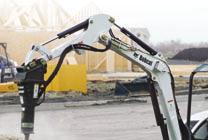 Uses a hydraulic cylinder to angle the bucket 60 side-to-side, reducing the need to move the entire machine.