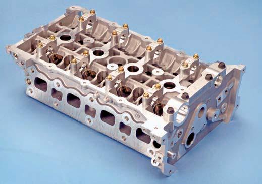CHAPTER 9 Automotive Engine Designs and Diagnosis 221 FPO Figure 9 3 A cylinder head for a late-model inline four-cylinder engine.