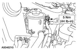 Detach the wiring harness. 3. Remove the nut and bolt and position the coolant expansion tank out of the way. 4.