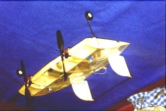 The current configuration is a flying wing powered by two electric mtors. Ninety percent of the wingspan is immersed in the prop-wash, giving the "Bidule" excellent low speed flight capabilities.