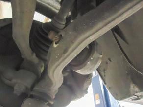 7. SEPARATE THE LOWER BALL JOINT FROM