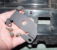 19. Plug the motor hole in the firewall with the Cover Plate. Use three 10-24 Screws and flat washers. The Cover Plate is Black Powder Coat. See Photo 20.