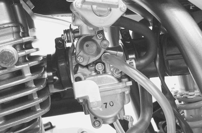 IDLE SPEED ADJUSTMENT After completing all of the servicing procedures, adjust the engine idle speed by turning the throttle stop screw. The engine idle should be adjusted with engine warmed up.
