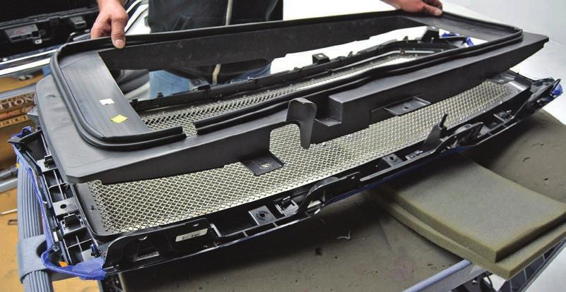 your new T-Rex Grille assembly. Line up the tabs and set it down in place.