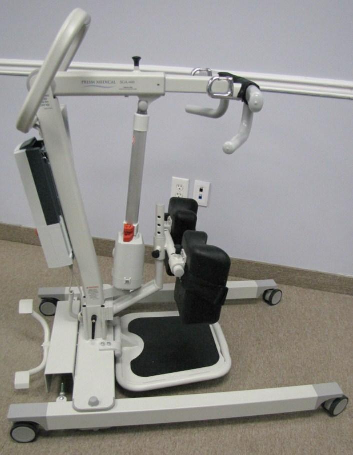 . Alternatively, the caregiver can also place one foot on the base tube and push forward