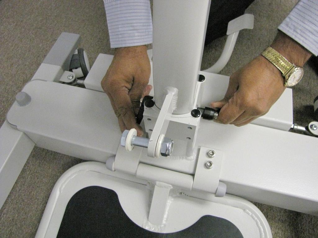 Adjust the position of the locking handles pointing in downward direction towards the base as shown in Figure 4.