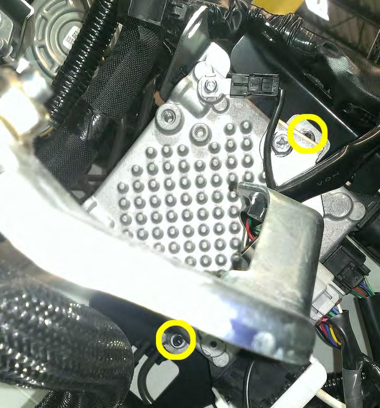 19. Using a 10mm socket, ratchet and 3 extension remove the (2) 10mm nuts