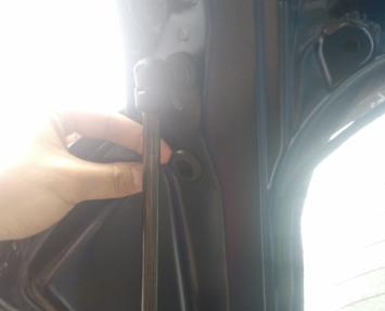 Using a helper or supporting brace, support the lift gate in the full opened position.