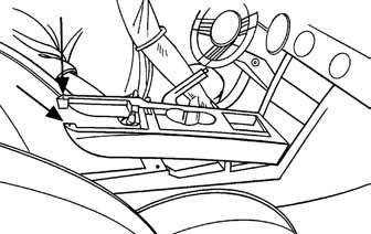 (Figure ) Remove () Phillips screws from under the center armrest at the back of the shifter trim panel (including