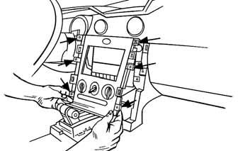 (Figure ) Unclip and remove the () center stack trim panels from the left and right side of the radio and climate