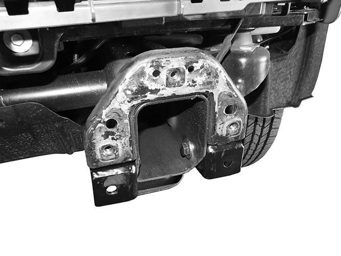 Driver side pictured Factory bumper bolts (top slots only) (Fig 6B) Attach Support Brackets to frame using 