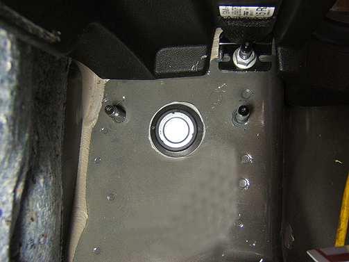 Page 5 of 7 11. Install the round body plug, GM P/N 25996758. Ensure that the plug is sealed with the silicone sealant. 12. Reinstall the floor covering and seat.