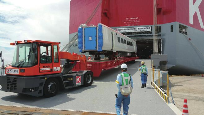 The car carrier loaded rolling stock (inserted photo) constructed for an intercity train service in the UK at Pier No. 2 of Tokuyamakudamatsu Port in Yamaguchi Pref.