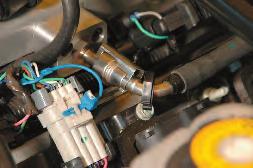 Connect the line from the other throttle body barb to the