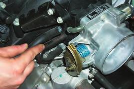 5. Remove the PCV hose that connects the