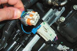 13. On both sides of the engine disconnect the ignition coil pack