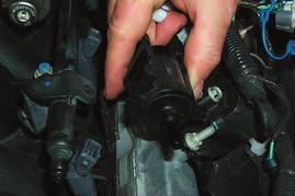 17. Remove the Purge solenoid and EVAP line by pulling the solenoid free from its