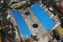 25. Cover the intake ports with tape or clean rags to keep dirt and debris from entering the engine. 26.